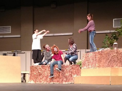 College theatre students (from left ) Madyson Riedinger, Lauren Asher, Jake Frankenberry, Emily McCaslin and Sadie Wenzel practice a scene from a Midsummer Nights Dream, which will be performed Nov. 3-4.