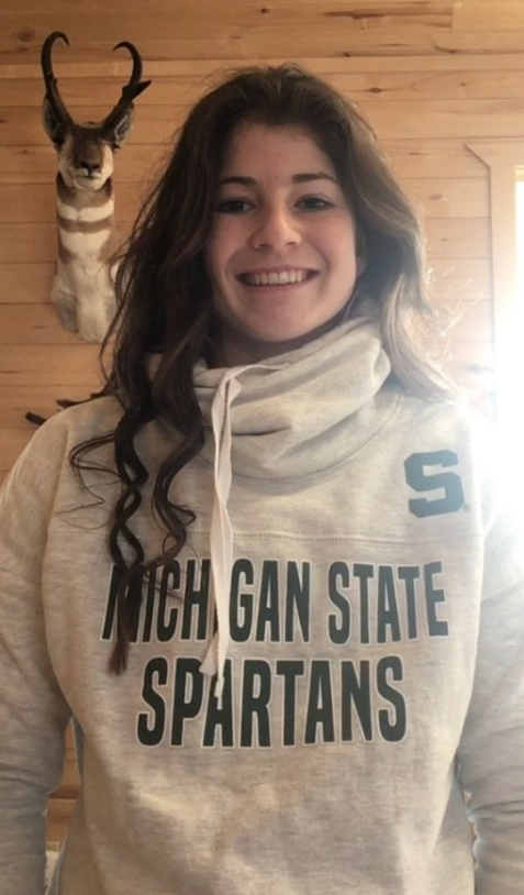 Maddy+Hanks+shows+off+her+Michigan+State+University+sweatshirt.