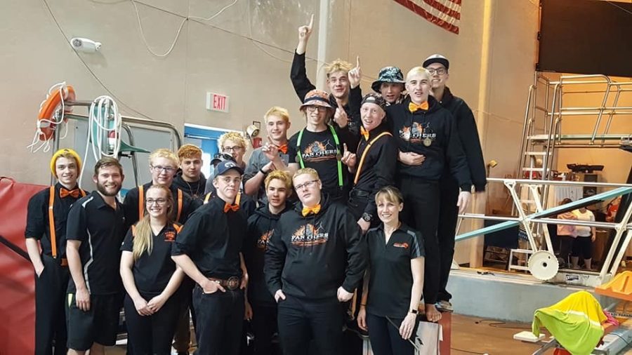 Members of the PHS boys' swimming and diving team pose at the conference meet.