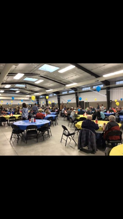 Community members enjoy a steak dinner at the Park County Fairgrounds on March 17.