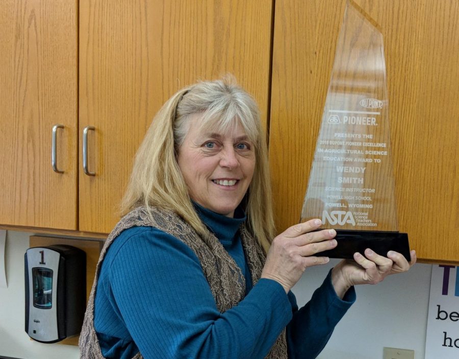 Mrs. Wendy Smith displays her science award.