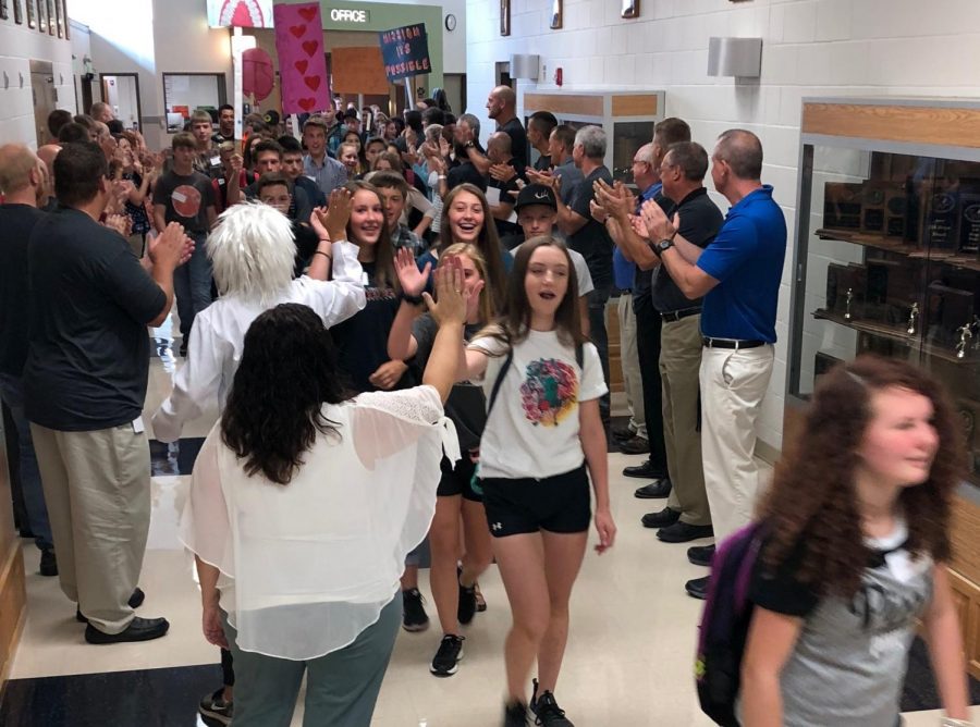 PHS staff greet the Class of 2022 on Wednesday morning.