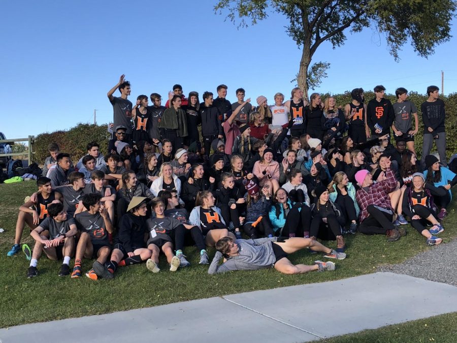  About 90 runners from Hoover, Alabama pose for a group photo after the Powell cross country Invitational on Friday. 