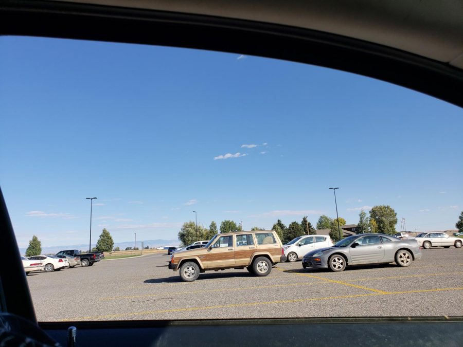 Cars in the student parking lot.
