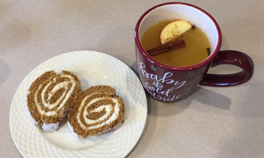The pumpkin cream cheese roll-up compliments hot wassail cider well for a perfect fall treat.
