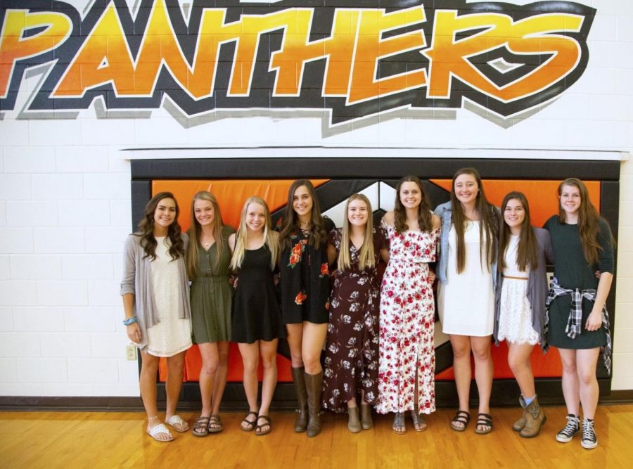 The+Lady+Panther+Varsity+seniors+on+the+volleyball+team+pose+before+their+last+home+game+in+the+Panther+gym.+Team+members+include%3A+%28from+left+to+right%29+Jazlyn+Haney%2C+Aubrie+Stenerson%2C+Natalie+Ostermiller%2C+Becky+Mcconahay%2C+Ashtyn+Heny%2C+Hartly+Thorington%2C+Rachel+Bonander%2C+Jasmyne+Lensegrav+and+Devon+Curtis.