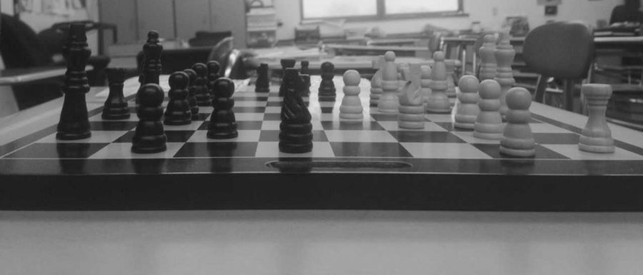 The+battle+begins+as+Austin+Chandler+and+Lane+Summers+began+moving+their+pieces+forward+during+last+Tuesday%E2%80%99s+Chess+Club+meeting%2C+both+hoping+to+conquer+the+other%2C+but++neither+knowing+the+other%E2%80%99s+game+strategy.