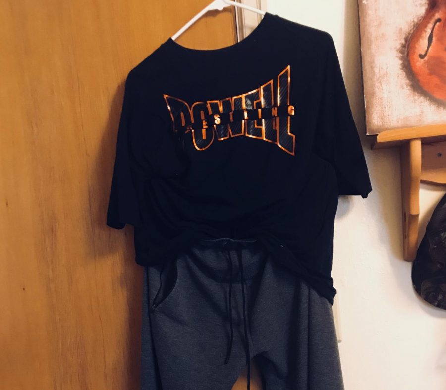 Alina O’Leary's Thanksgiving dinner outfit hangs in her bedroom, awaiting the holiday meal.