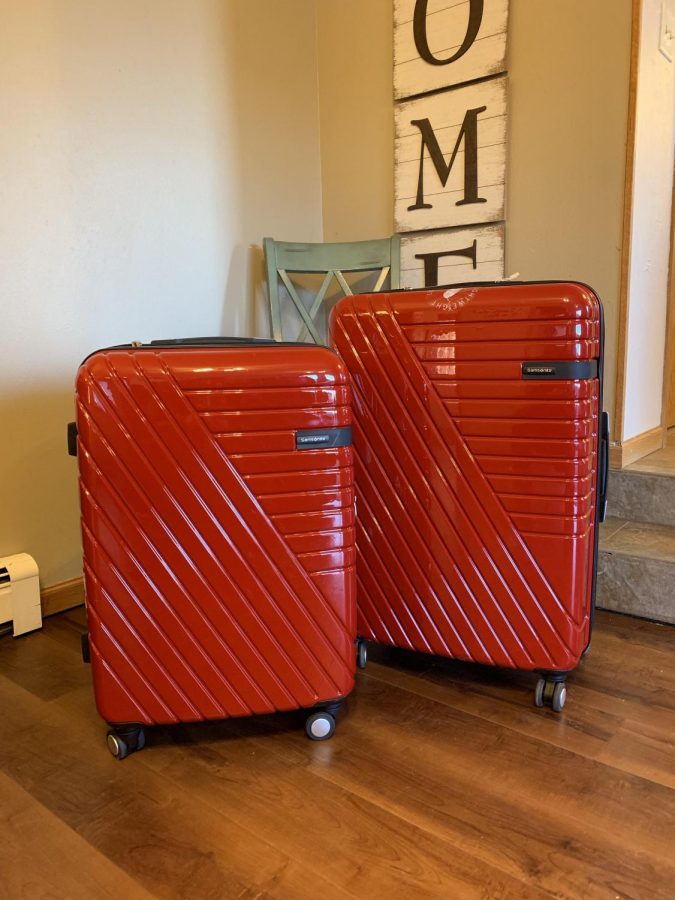 Luggage packed and ready to go for an upcoming trip. 