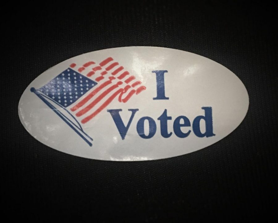 Voters received an “I VOTED” sticker after inserting their ballots into the ballot box.