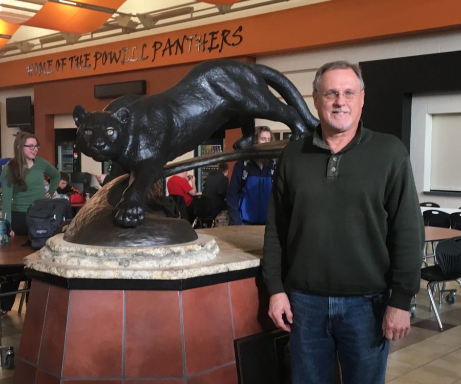 PHS Principal Mr. James Kuhn poses next to the Panther statue in the Commons on Monday morning.