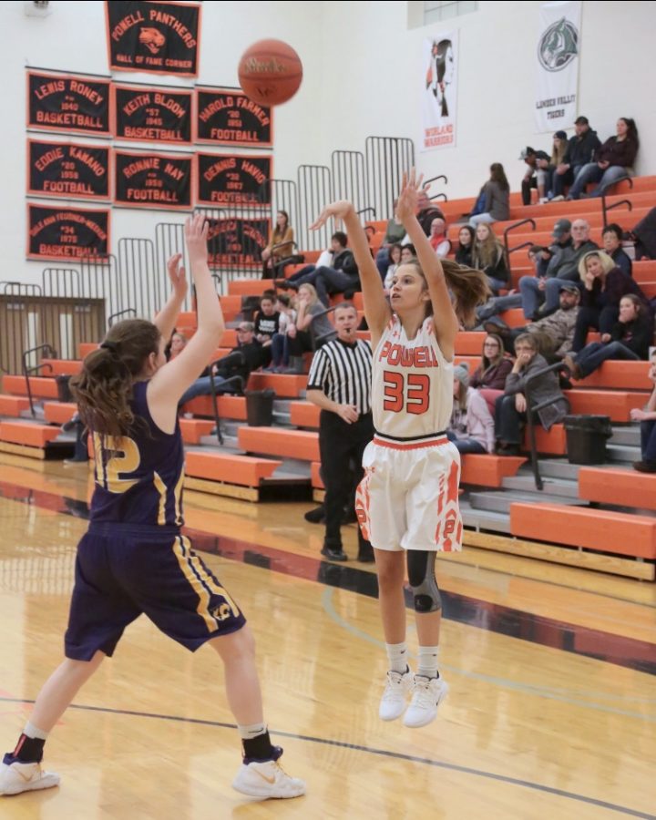 Senior Brea Terry takes a three-point shot against the Thermopolis Lady Bobcats at the Bighorn Basin Shootout Jan. 11-12.