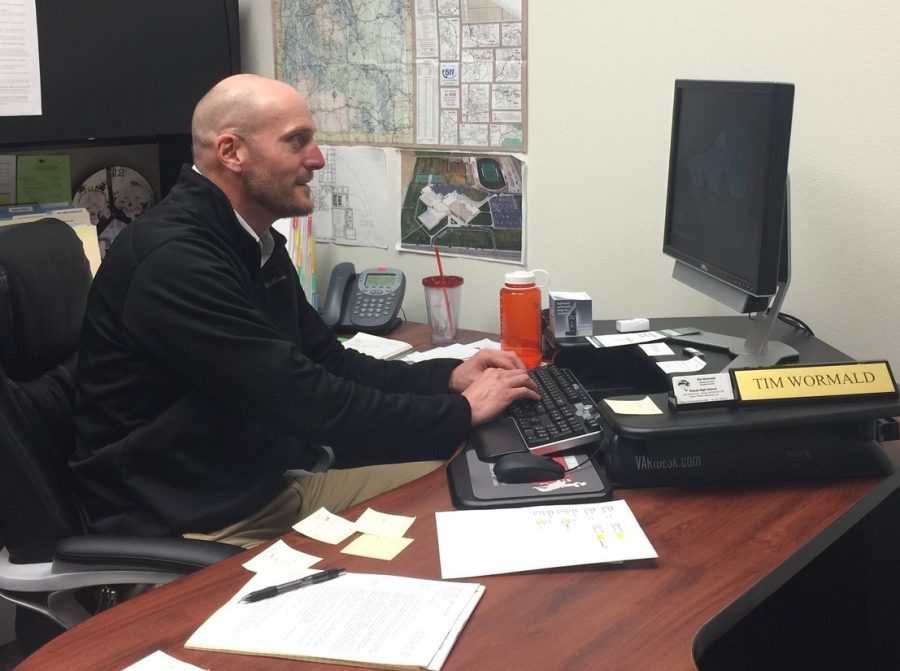 PHS Assistant Principal Mr. Tim Wormald works at his desk Wednesday afternoon. Mr. Wormald was officially announced as principal for the upcoming school year Jan. 15.