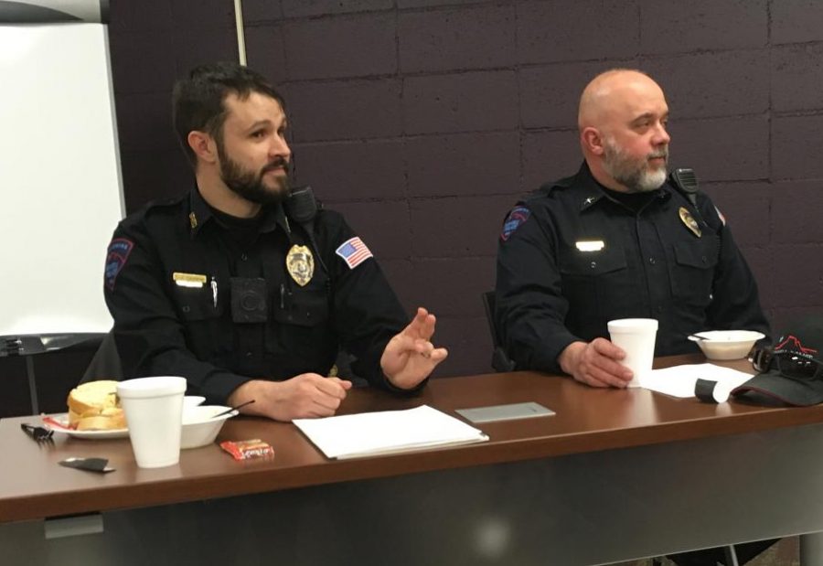 School+Resource+Officer+Mr.+Trevor+Carpenter+%28left%29+and+Chief+of+Police+Mr.+Roy+Eckerdt+answer+questions+from+Powell+High+School+students+in+the+community+meeting+Feb.+6.