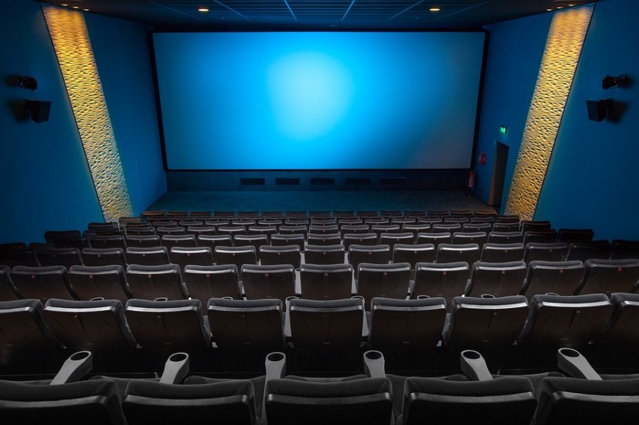 An empty movie theater awaits the company of film watchers. 
