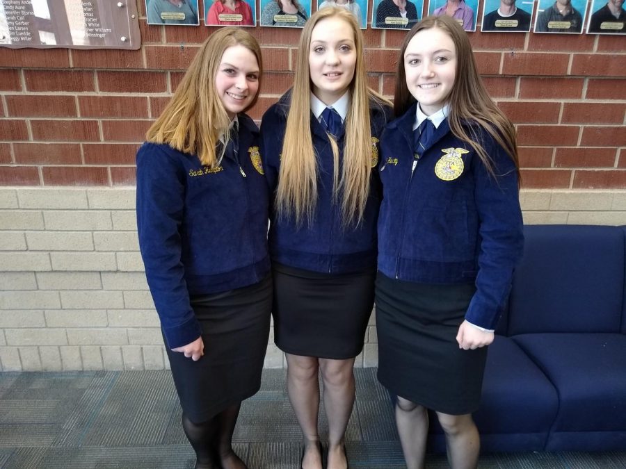 (From left) Sarah Hampton, Whitney Jones and Madi Harvey pose for a picture at district speech in Cody.