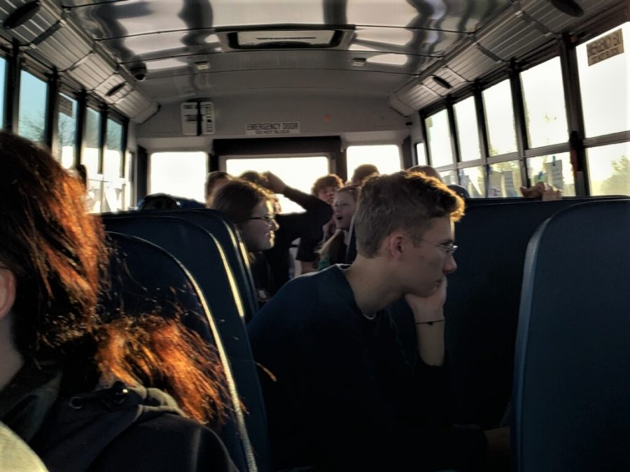 The Powell High school speech and debate team ride the bus back from their state competition in Riverton, Wyoming. 