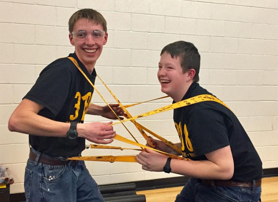 Alan Merritt (left) and Caden Sherman prepare to snap each others suspenders during the state competition in Casper. 