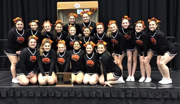 The PHS Cheer squad poses with the state cheer competition Game Day first-place plaque March 6 in Casper.