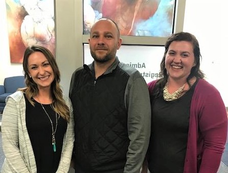 Northwest College Administration Staff, Kendle Dockham, West Hernandez and Kennedy Corr pose for a picture.