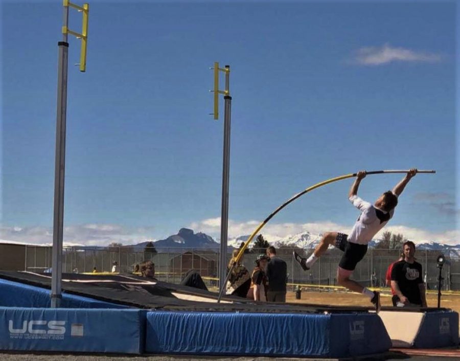 Freshman Reed Smith warms up in pole vault before Powell’s L.A. Kohnke Invitational starts.
