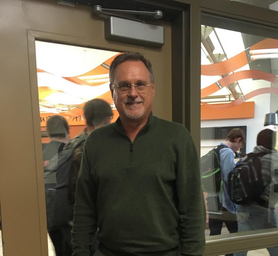PHS principal Mr. Jim Kuhn poses for a photo in the main office. Mr. Kuhn will retire at the end of the year.