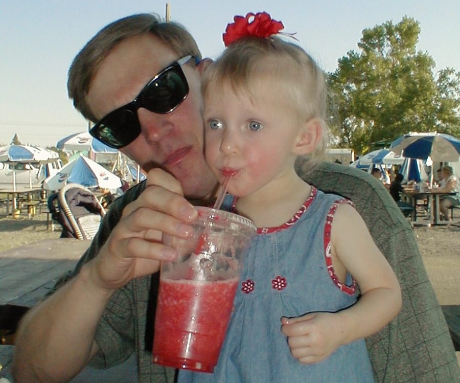 Young+Kayla+Kolpitcke+drinks+a+strawberry+smoothie+at+the+Park+County+Fair.+For+many+years%2C+it+was+the+only+thing+she+was+able+to+drink+or+eat+at+fair+because+of+her+allergies.