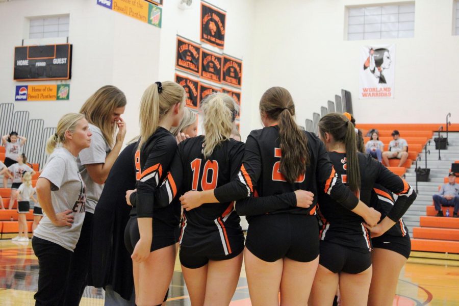 The Lady Panthers huddle in for a meeting with their coaches during the Thursday night home volleyball game against the Thermopolis Lady Bobcats
