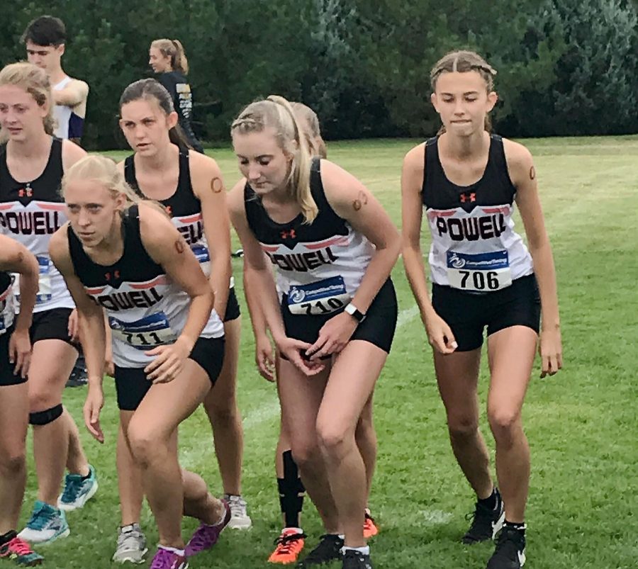  The Lady Panther Varsity team get ready to race.