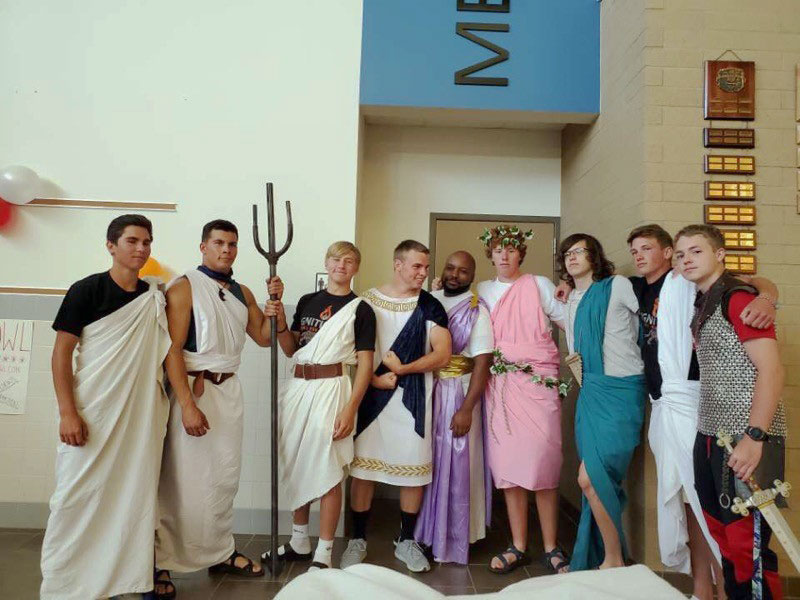 Mentors+pause+for+a+photo+of+their+Greek+costumes+during+Ignition.%C2%A0%28From+left%29+Joey+Hernandez%2C+Brody+Karhu%2C+Riley+Bennett%2C+Kadden+Abraham%2C+Latrell+%282019+Ignition+Trainer%29+Grant+Dillivan%2C+Nicolas+Fulton%2C+Aidan+Jacobsen+and+Averee+Johnson