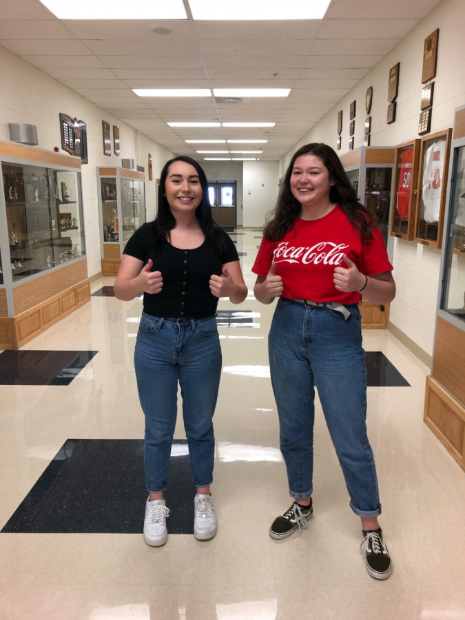 (From left to right) Tenna Desjarlais and Emma Bucher wearing mom jeans.