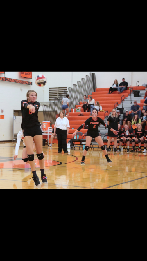 PHS junior passes the volleyball during a game earlier this fall.
