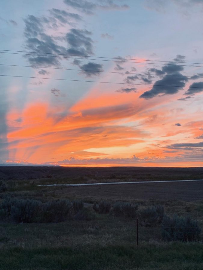 A sunset taken on the Highway 295 between Powell and Greybull while Mr. Brandon Preator drives his family home to Burlington.