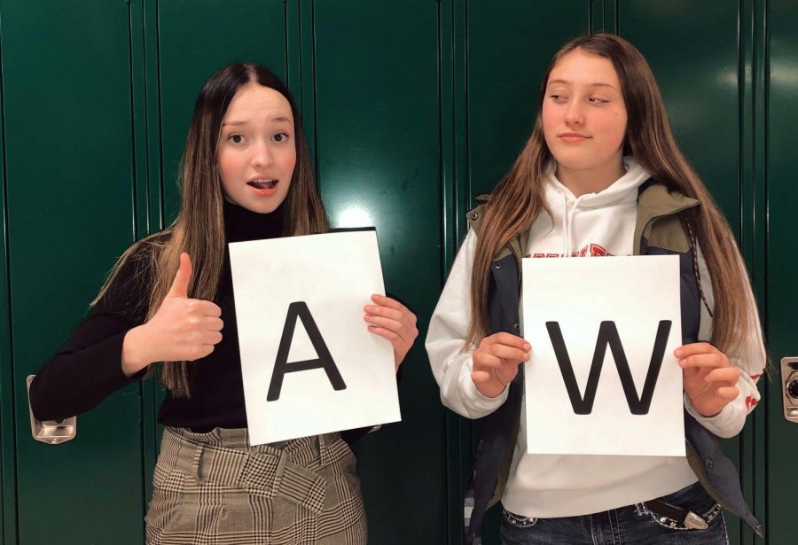  Prowl reporters (from left) Kalli Ashby and Emerson Wormald pose for a picture representing their feelings toward their first letter of their last name
