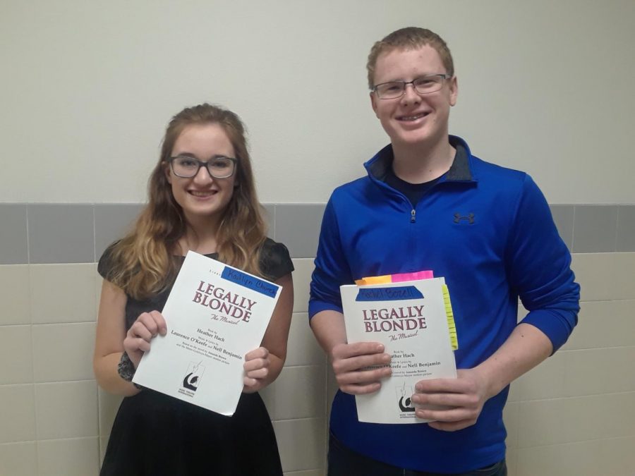 Seniors Kaitlyn Church and Dallin Allred pose with scripts for their first musical “Legally Blonde.” 