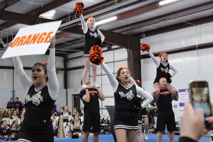 PHS cheer team at Game Day cheer competition on Saturday February 15. From left, senior Luci Abarca, sophomore Morgan Schmidt held by senior Brody Karhu, sophomore Josseline Mendoza, and sophomore Lorena Vazquez held by junior Geordan Weimer. 