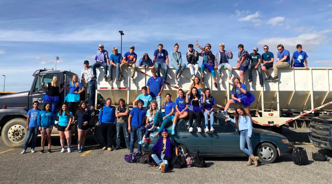 A portion of the Powell High School 2020 senior class poses together on Color Day during Homecoming week in September 2019.