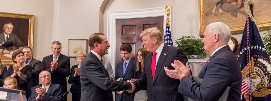 President Donald Trump pictured with U.S Department of Health and Human Services (HHS) Secretary Alex Azar (left). 