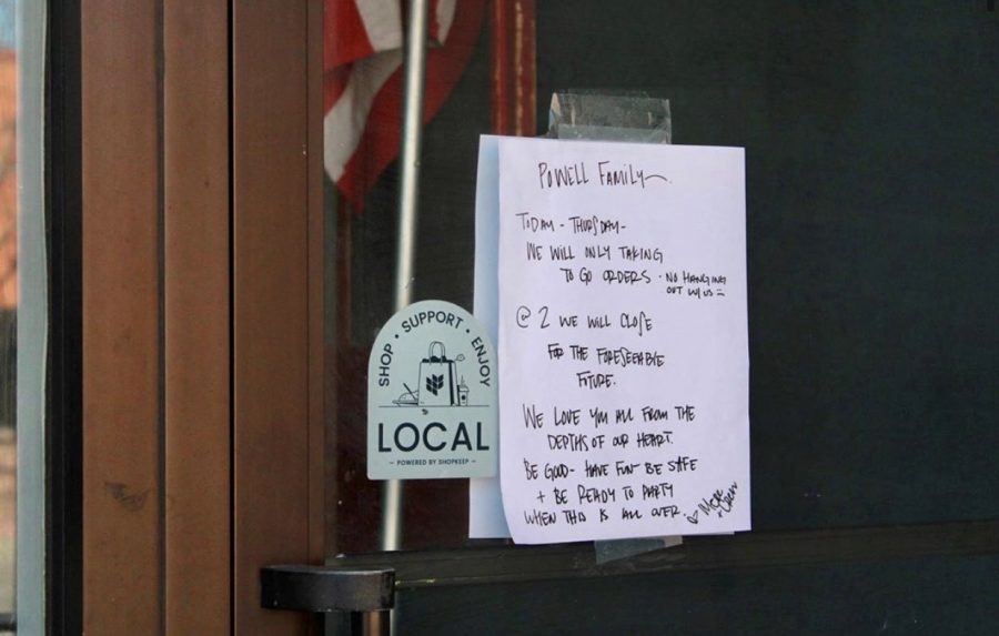 Local coffee shop Uncommon Grounds posted a note on its window addressing how business will continue through the COVID-19 outbreak.