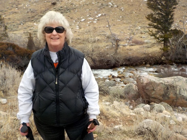 Mrs. Katherine Ackley poses for a picture during a hike. 