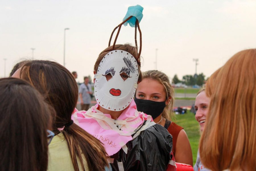 PHS freshman Case Bradish looks to the camera while wearing a mask made by his team.