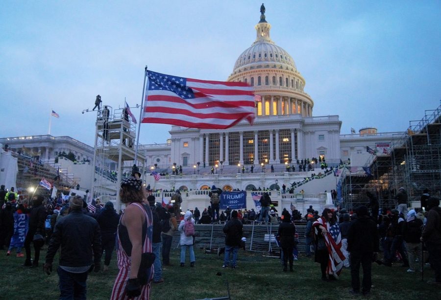 Protesters surround the U.S. Capitol on Wednesday, Jan. 6. Five people died as a result of the riot, which was staged while Congress was certifying the Electoral College presidential results.