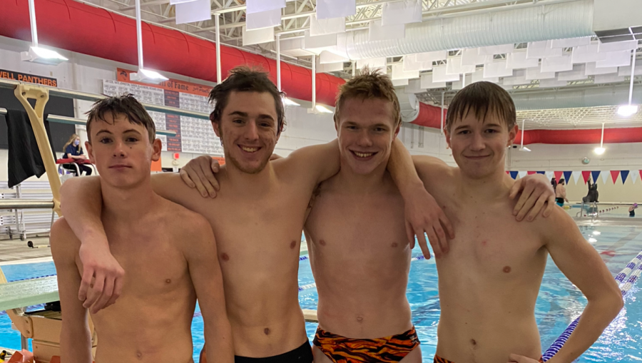 Four of Powell High School’s five divers pose for a picture on Jan. 18, the day they got to come back from quarantine. (from left) Sophomore Ashtin Prentiss, junior Cole Frank, junior Caiden Gehrts and freshman Jonathan Hawley.