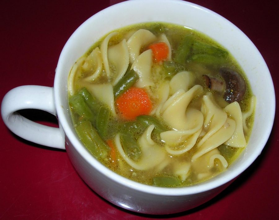 A+perfectly+sized+mug+of+chicken+noodle+soup+mixed+with+carrots%2C+celery%2C+mushrooms+and+fresh+chopped+parsley.%C2%A0