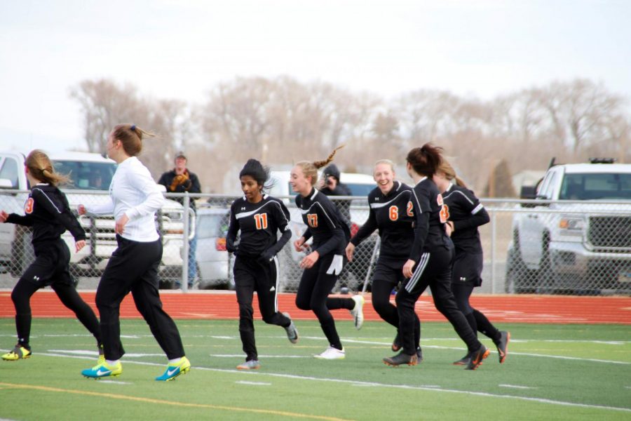 The Lady Panthers celebrate a goal made by Kayla Kolpitke. The team won 3-1 against Pinedale on March 29, 2019.

