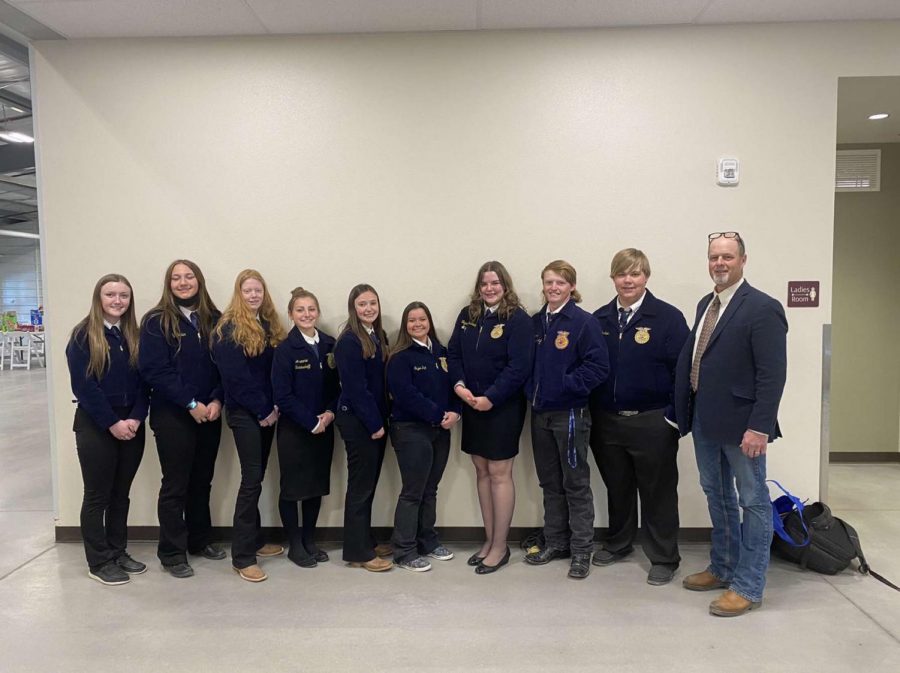 FFA members pose for a picture after competing at the state competition in Douglas on April 8. (from left) Junior Madison Harvey, freshman Shelby Carter, freshman Charlee Brence, freshman Aramonie Brinkerhoff, senior Amber Visocky, senior Tegan Lovelady, senior Stephen Dahl, junior Jace Nordeen and Adviser Mr. Bryce Meyer. 