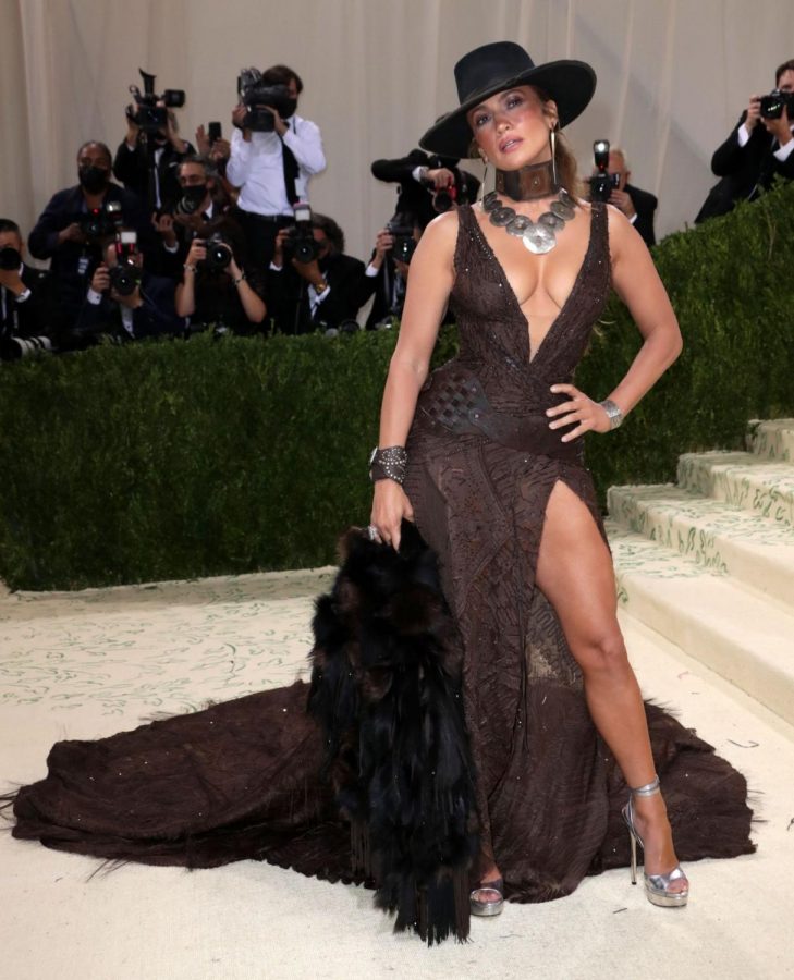 Jenifer+Lopez+wears+her+faux-fur+dress+on+the+steps+of+The+Met+Gala.