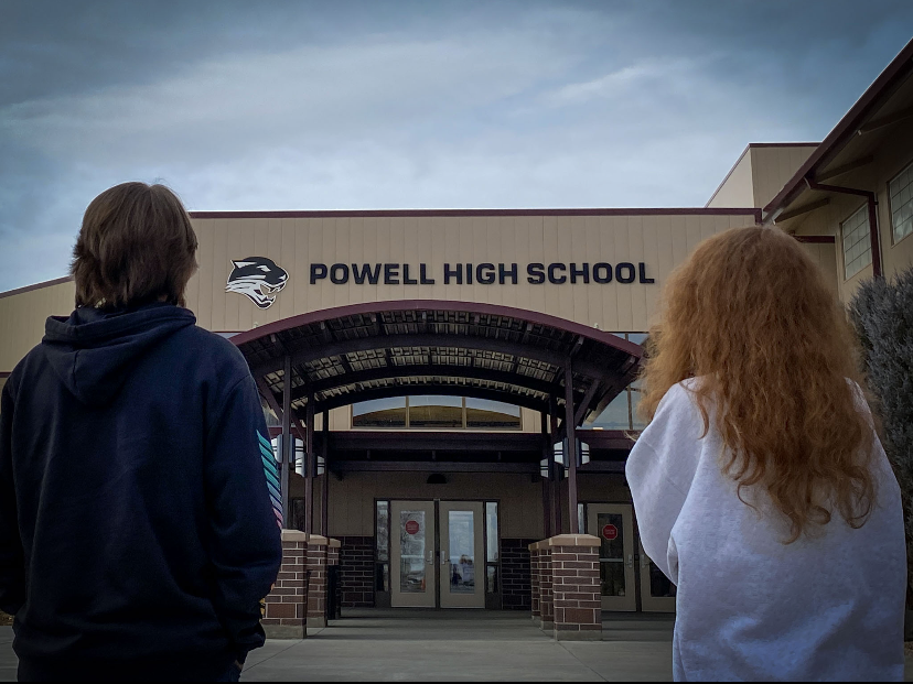 Prowl associate editor Aiden Chandler and editor-in-chief LucyJane Crimm stand in front of PHS and reminisce about their high school experience. Crimm will be graduating at the end of first semester and Chandler will be taking over the role of editor-in-chief. 