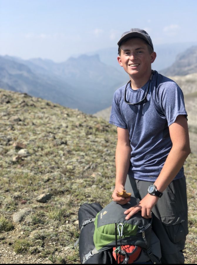 PHS junior and Dano Alumni Owen Fink smiles for the camera at the top of a peak on one of his Dano backpacking trips. Fink is heading to Washington D.C. to become a Senate Page for the remainder of his junior year.