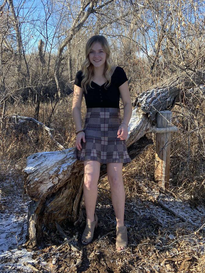 PHS Junior Blake Nissen displays her skirt in the cold Wyoming Weather. 